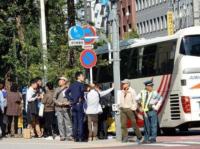 中国男朝日本公务人员脸上吐口水被逮捕（组图） - 4