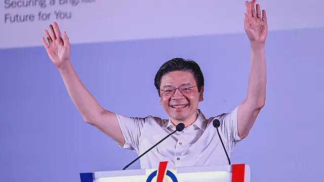 新加坡大选：选民在全球不稳定投向执政党怀抱，人民行动党大胜（组图） - 1