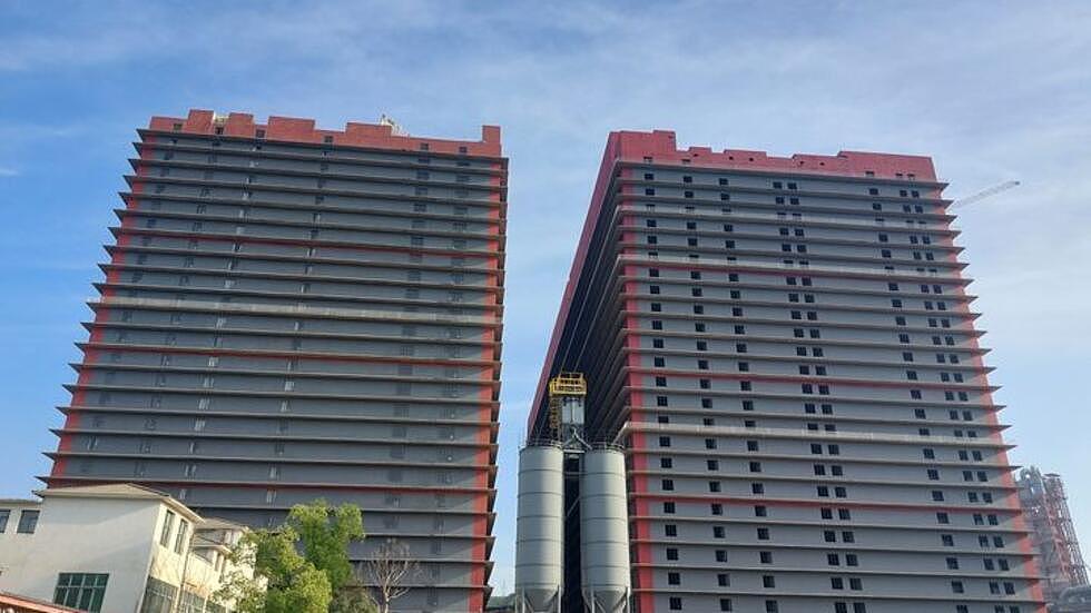 中国越来越多猪被饲养在高耸矗立的“猪塔“里（图） - 1