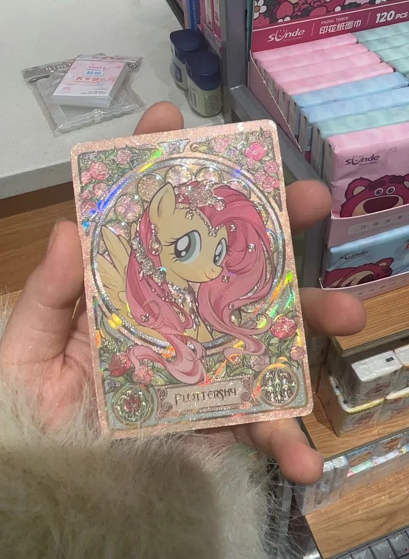 夫妻卖卡给小学生，一年净赚44亿（组图） - 7