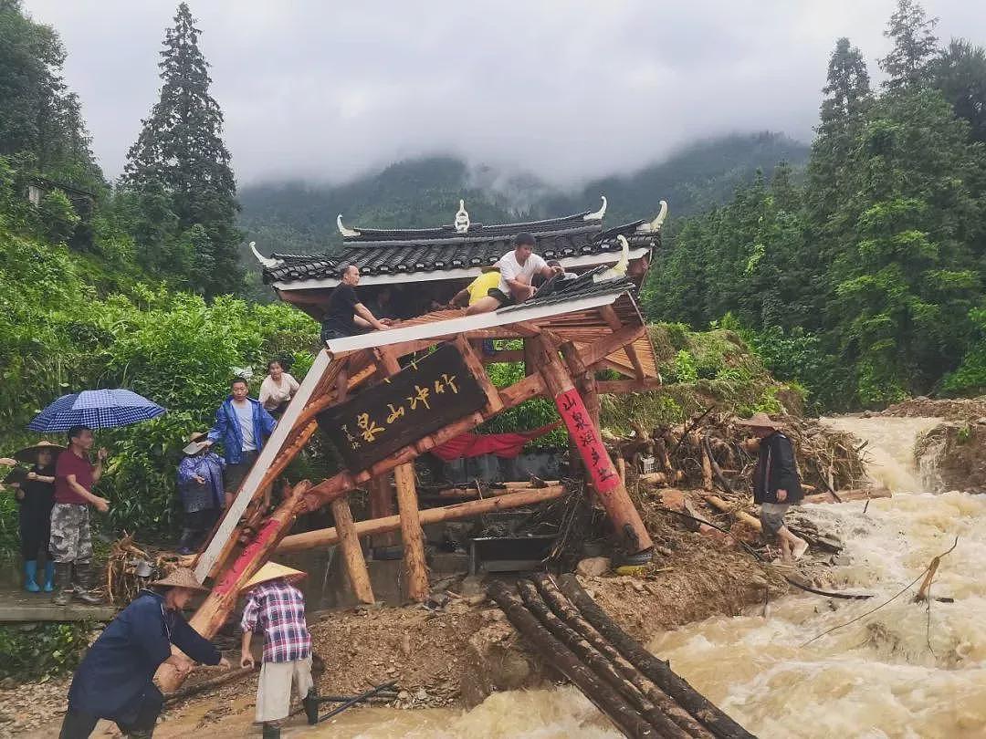 暴雨72小时:冲垮的稻田,中断的生活(组图) - 6