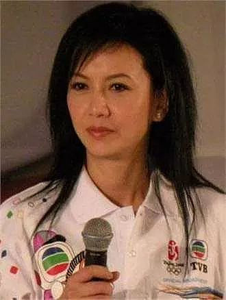 与梁朝伟同居了6年分手,独自抚养儿子长大(组图) - 5