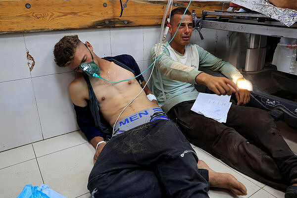 加萨援助点抢粮爆踩踏!至少20人死亡(组图) - 1