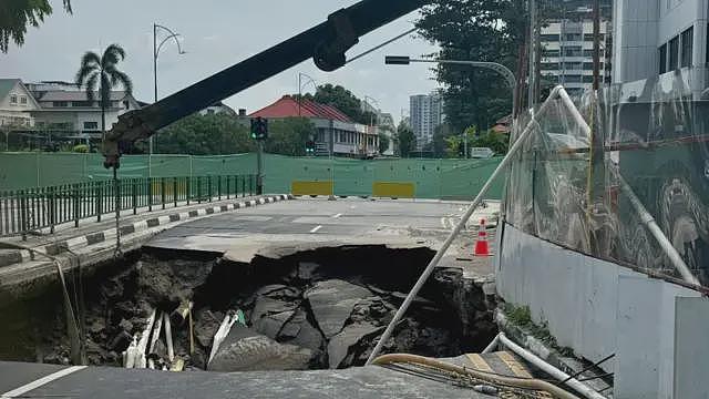 新加坡塌陷事件再引移民工人权利争论（组图） - 1