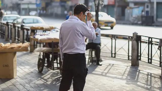 世界正变得愈来愈热,这如何影响我们的大脑(组图) - 2