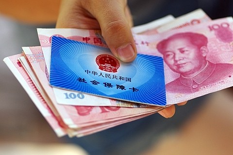 中国多地提升最低工资，缓解强制社保怨气？（组图） - 1