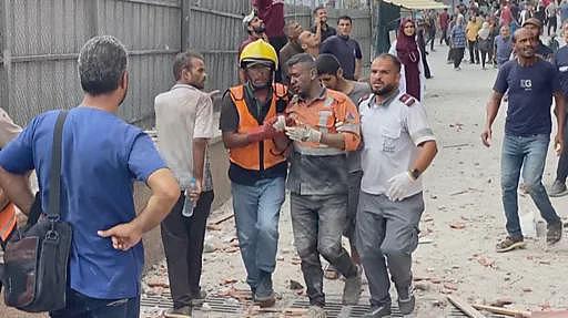 以色列袭击加沙医院致20人死亡,包括5名国际媒体记者(组图) - 1