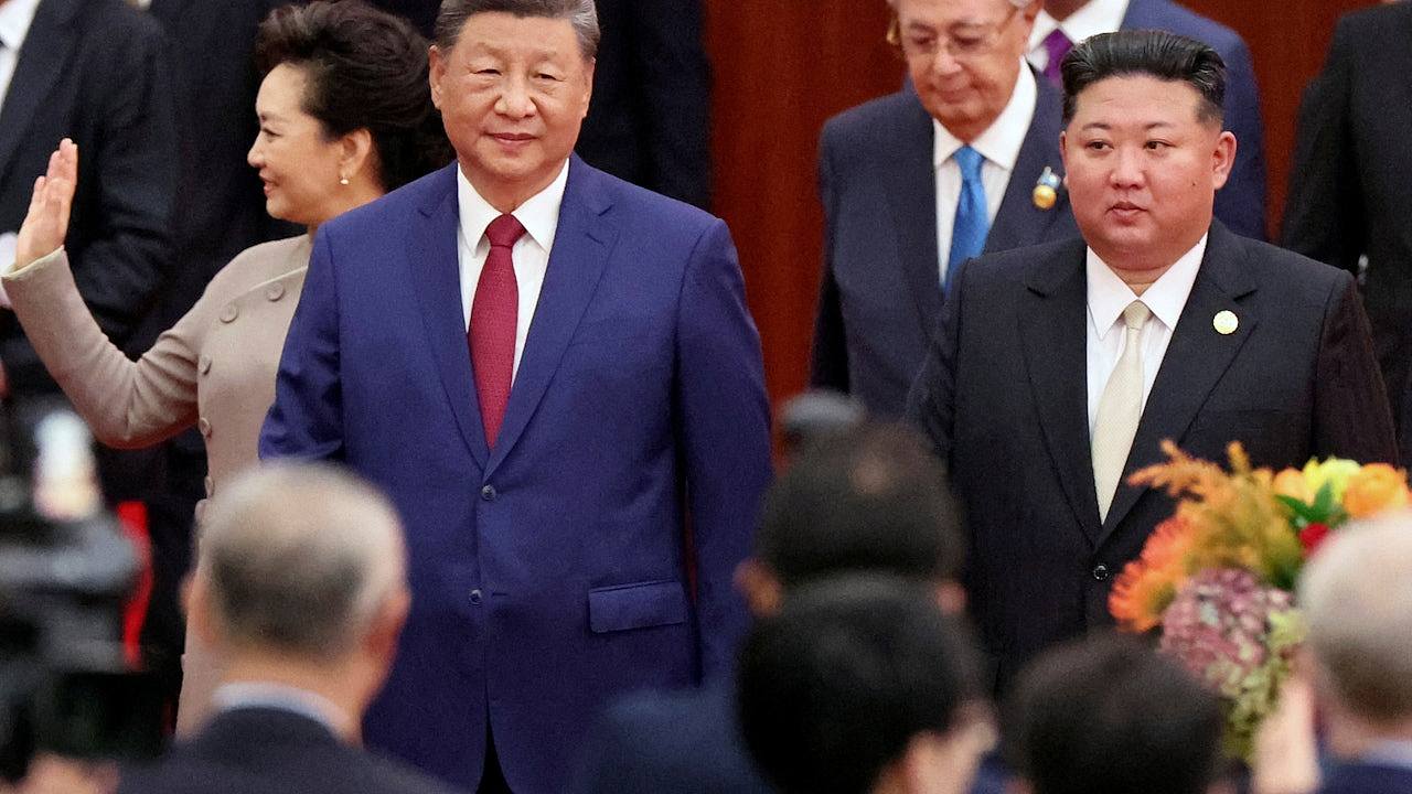 和习近平普京并肩,金正恩的闪亮登场酝酿了14年(组图) - 1