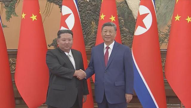 习近平金正恩六年来首会,称友谊“永不变”、提及台湾问题(组图) - 1