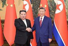 从九三阅兵看出中联部异动？ 刘建超“失踪”月余，接待金正恩也换人（组图）