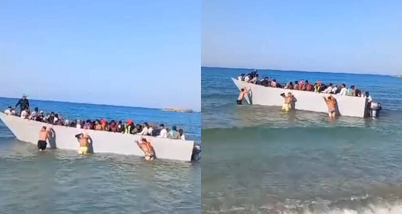难民船靠岸求庇护，希腊游客下水“推回海里”（图） - 1