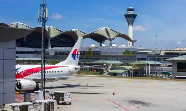 为取消航班谎称机上有炸弹,中国夫妇在马来西亚被捕(组图) - 3