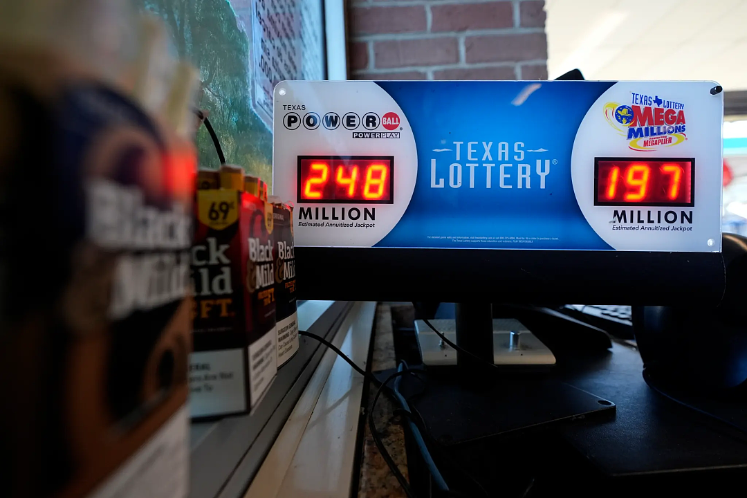 一夜暴富！神秘人买2580万种彩票组合，中9500万大奖（组图） - 2