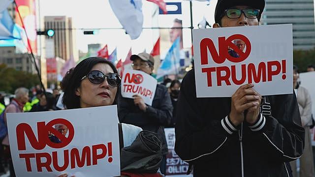 “不要特朗普!不要中国!”夹在两大强权国家之间的韩国为中美峰会铺路(组图) - 1