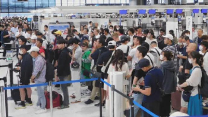 偷中国游客现金，日本机场一安检员被捕（图） - 1