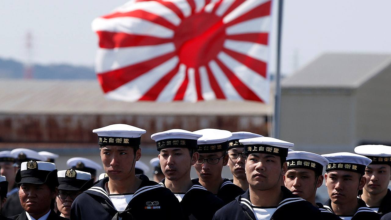 人民日报：日本只有恪守和平宪法，才有立世之本（组图） - 1