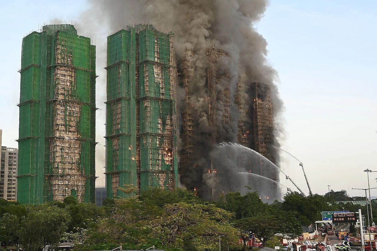 香港大火完成灭火程序,已致94人遇难(组图) - 3