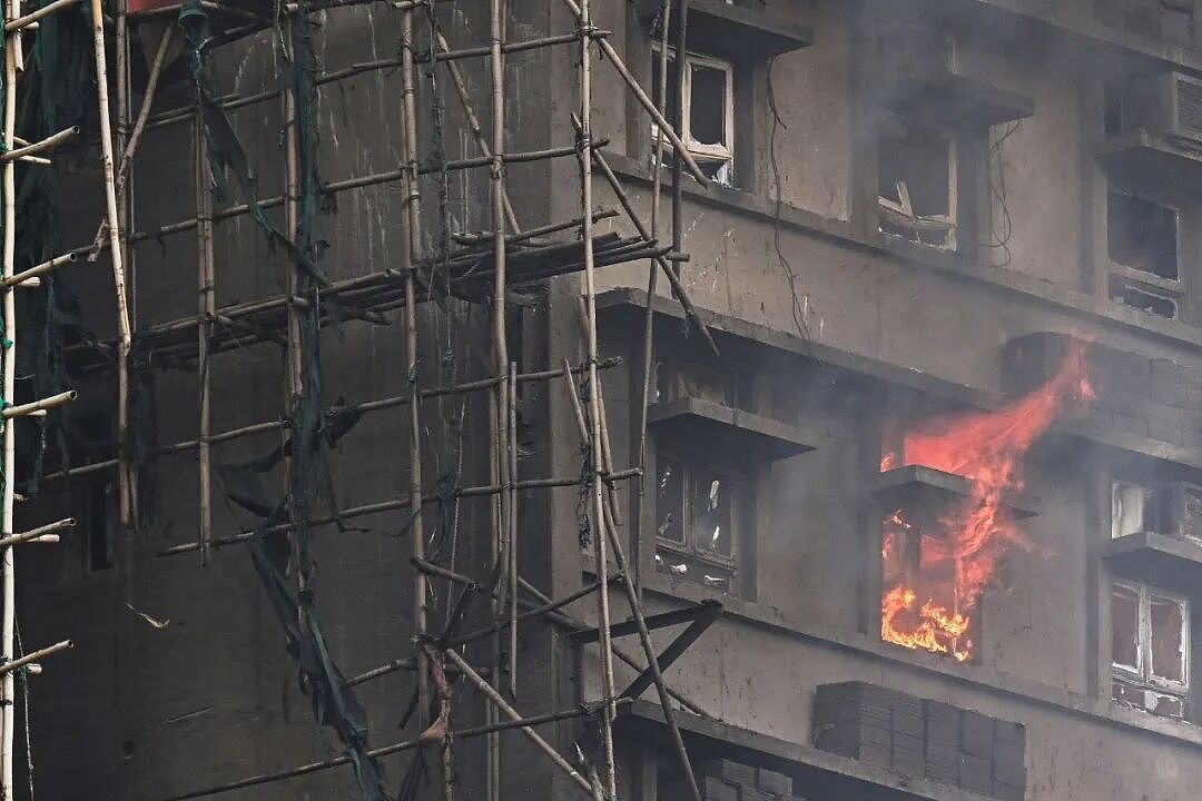 香港大火完成灭火程序,已致94人遇难(组图) - 21