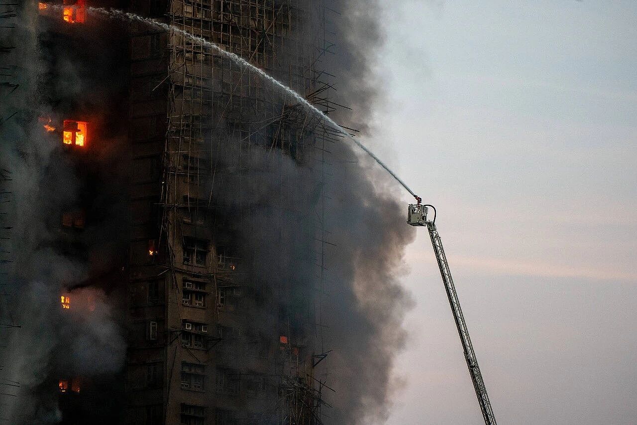 香港大火完成灭火程序,已致94人遇难(组图) - 4