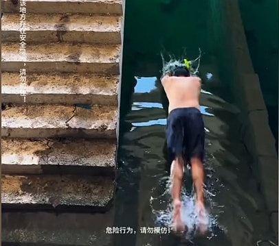 广西烂尾楼积水变网红潜水地！住建局：项目长期停工，有溺水隐患（视频/组图） - 1
