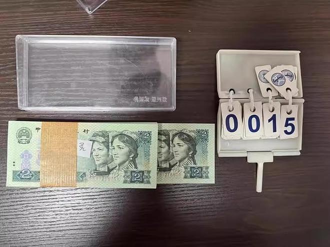 法院以20.76万元拍卖105捆2元纸币,40人争抢叫价已达42万元(组图) - 3