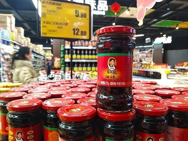 老干妈创始人“出山救子”！3年内年营业回54亿元巅峰（组图） - 1