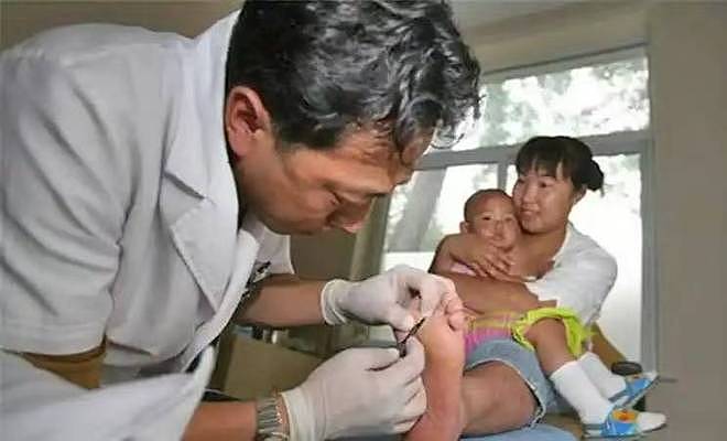 长跑冠军艾冬梅：被克扣20万，脚畸形带娃卖菜，生活窘困贱卖奖牌 - 5