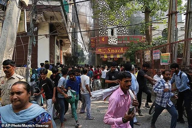 21人惨死！酒店突发恐怖大火，客人被迫跳楼逃生（组图） - 9